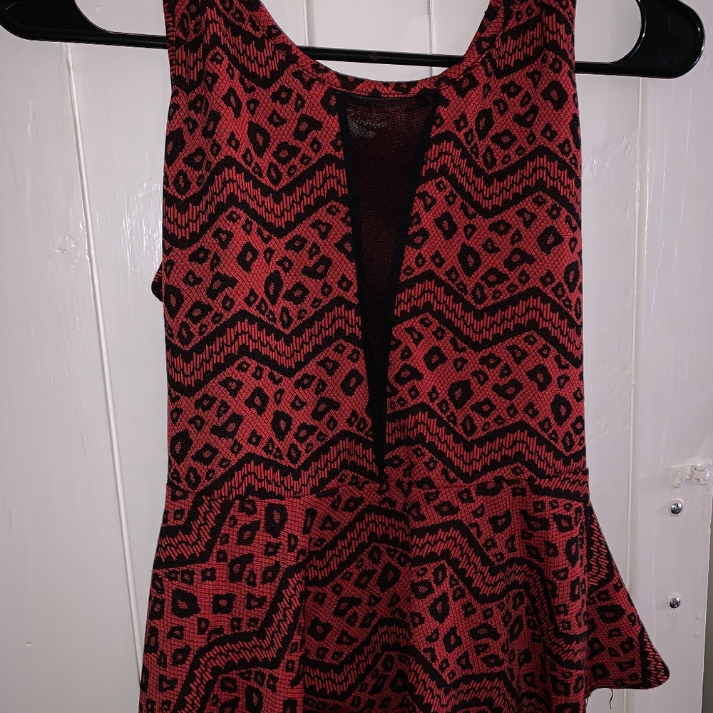 Classy red and black sleeveless blouse!
